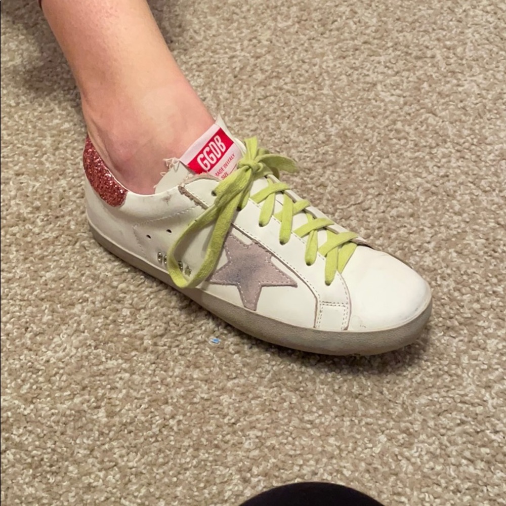 White golden goose sneakers with green laces